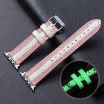 Luminous cowhide leather watch band in pink with white accents, compatible with Apple Watch Series models.