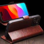 غطاء هاتف من الجلد الطبيعي الكلاسيكي QIALINO مع إبزيم 103، لهواتف iPhone 17e / 16e، iPhone 17 Pro Max، iPhone 17 Pro، iPhone 17، iPhone Air، iPhone 15 Pro Max، iPhone 15 Plus، iPhone 15
