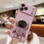 غطاء هاتف بحامل رائد فضاء مطلي بالكهرباء، لهواتف iPhone 17e / 16e، iPhone 17 Pro Max، iPhone 17 Pro، iPhone 17، iPhone Air، iPhone 16 Pro Max، iPhone 16 Pro، iPhone 16 Plus